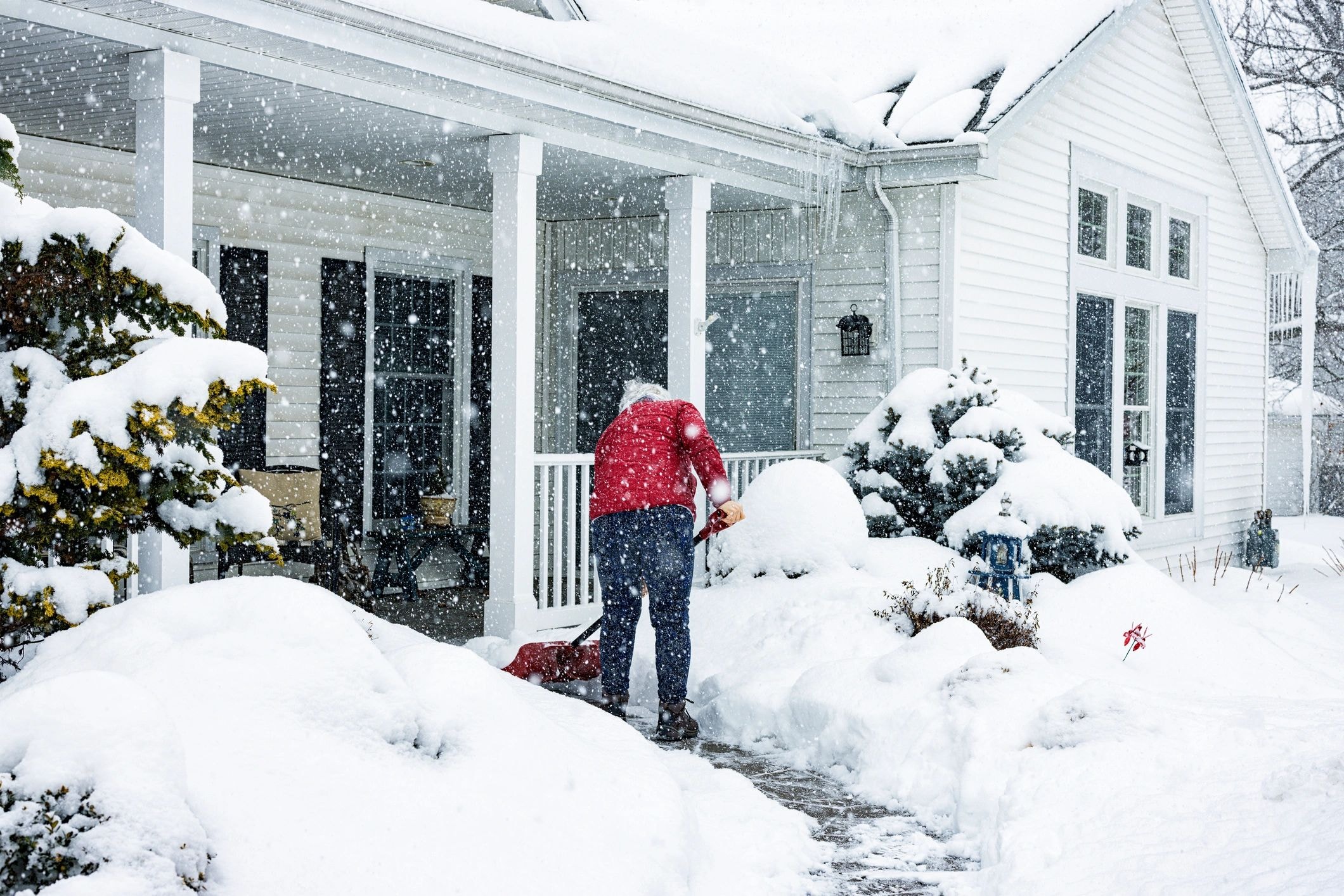 Snowmere crew clearing a driveway in Chestermere